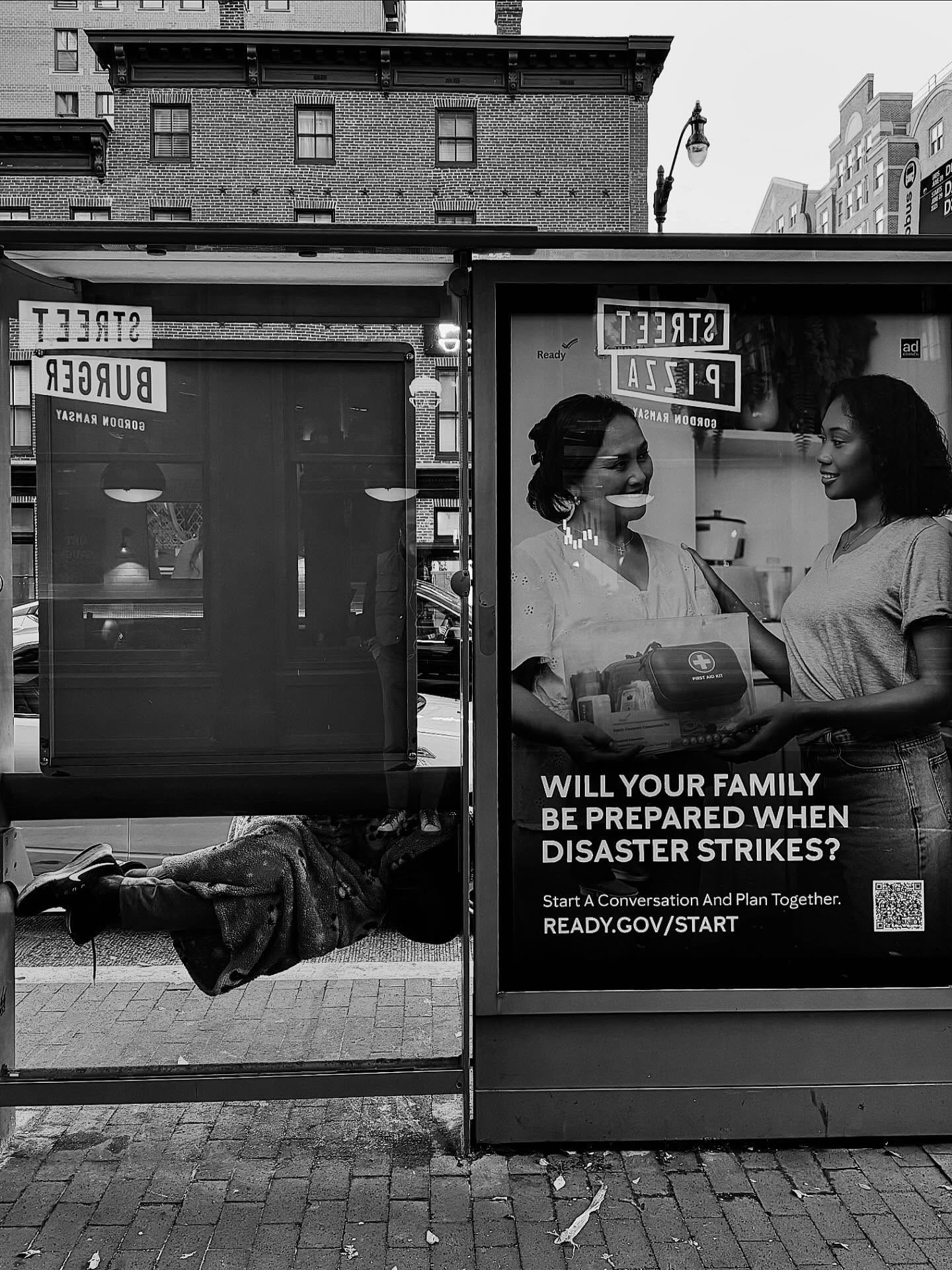 Bus shelter, sleeping figure, Will your family be prepared?
